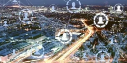 grafika pokazująca oferty pracy w sprzedaży jako połączone ikony ludzi rozrzucone po całym mieście